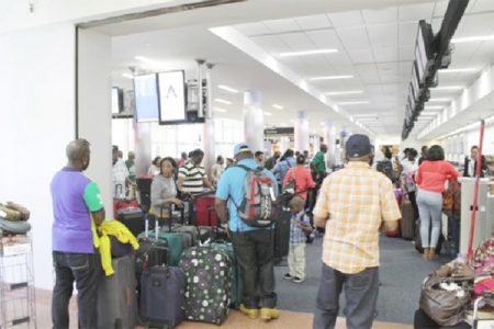 Flashback - Passengers being checked in for a Dynamic Airways return flight to Guyana at the Atlantic City Airport.
