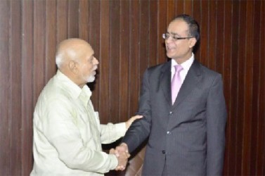 President Donald Ramotar (left) meets Commonwealth Deputy Secretary General Deodat Maharaj who paid the Head of State a courtesy call yesterday (GINA photo) 