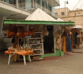 A small craft booth outside the Guyana Post Office Corporation building