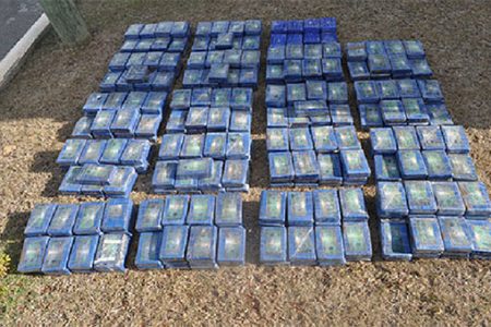 The seized cocaine that was discovered on the Old Runway property in Antigua. (Photo courtesy of the ONDCP) 