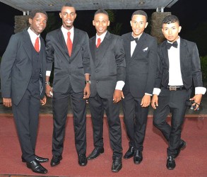 Mr Guyana Talented Teen 2014 Delroy Walcott (second left) and First Runner-up Daniel Ifill (second right) pose with some of the other contestants at the Pegasus Hotel on Cotillion night.