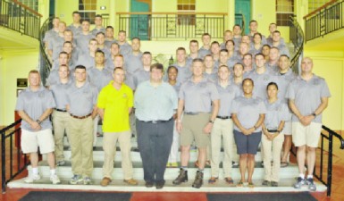 The CULP cadets pose with their instructors and US Embassy Chargé d’Affaires Bryan Hunt
