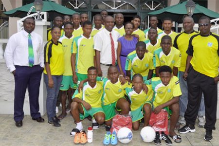 The National under-17 football team in a photo opportunity with president of the GFF, Christopher Matthias and members of the travelling contingent.

