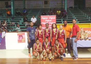 Ladies division champs, Kwakwani Secondary showing off their championship and individual titles