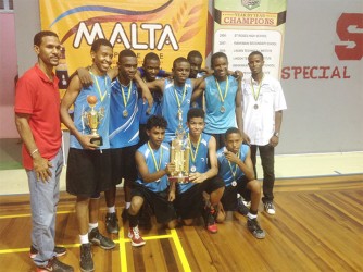 St. Rose’s High displaying their U-16 title following their victory over Kwakwani Secondary 