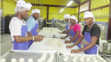 Making rolls: Doolie’s bakers hard at work