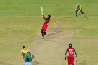 Sulieman Benn bowled comprehensively by Ronsford Beaton  (Orlando Charles photo) 