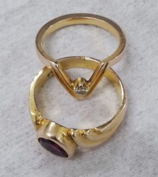 Gold rings with precious stones