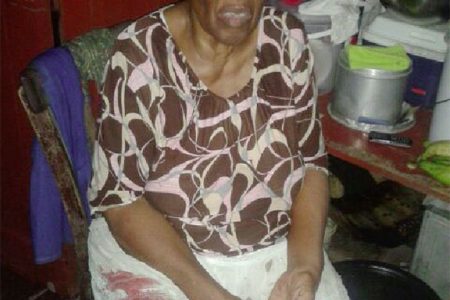 The dead man’s mother Ernestine Richmond with some of her son’s blood still soaked into her skirt.
