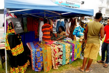 A pre-emancipation display of African wear and fabric