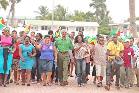 David Granger (centre) being led by his supporters into the Congress Hall yesterday.
