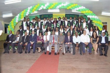 Minister of Agriculture Dr. Leslie Ramsammy and ICCA’s Country Representative Wilmot Garnett with the GSA Board of Director, staff and part of the 2014 graduating class in the Diploma in Agriculture (GINA photo)