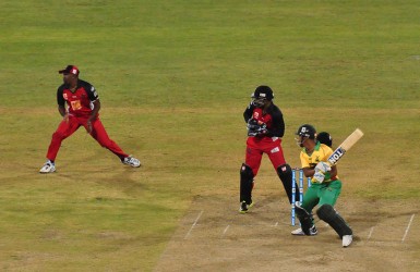 Lendl Simmons cuts through backward point in last night’s action at the National Stadium.