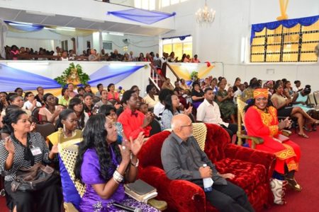 President Donald Ramotar (centre) in front row worshipping with the pastor and members of the Jesus Deliverance Mission International on Thomas Street, Kitty on Sunday. (GINA photo)