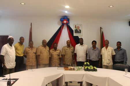 This police photo shows the donors with members of the police force today.