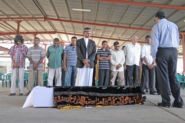 The last rites for renowned comedian Habeeb Khan (inset) were held yesterday at the  Central Islamic Organisation of Guyana on Woolford Avenue. Khan died last week in his sleep.  