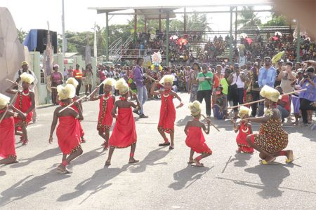 Dance of the warriors: Part of the lively Emancipation Day celebrations at the National Park on Friday. (Arian Browne photo)