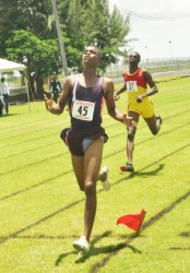 Ornesto Thomas running to victory in the boys 800m. (Orlando Charles photo) 