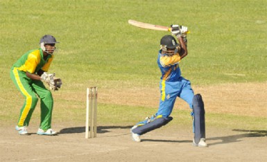 Barbados captain Joshua Drakes drives handsomely through the covers yesterday during his knock of 45 