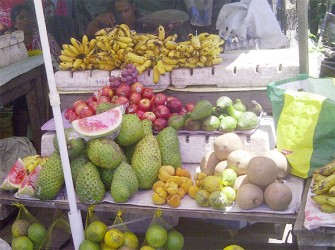 An assortment of fruits available at the Parika market