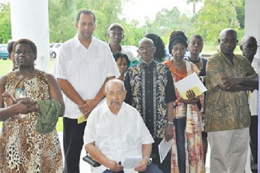 Seated is former Speaker of the National Assembly Sase Narain. At centre is City Mayor Hamilton Green.   (PNCR photo)   