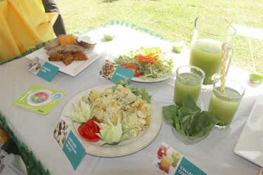Some of the meals and the callaloo beverage prepared by the Rural Enterprise and Agricultural Development Project (READ) unit for the Agriculture Ministry’s cook-off. (Photo by Arian Browne) 