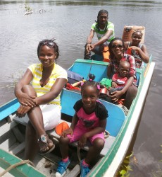 Our arrival: My sister Ernana and her daughter Akeelah, myself and my youngest Nickhol, my sister Akeisha and boat captain Sherlock Lindie (my cousin who opened his home to us) minutes after our arrival