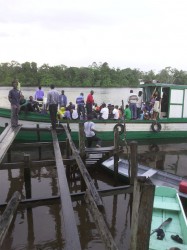 My Uncle Teddy’s boat packed to capacity with persons attending church. The crowd was even bigger as the men from Baracara paid a surprise visit to the De Velde Seventh Day Adventist Church 