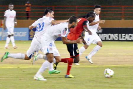 Alpha United’s Gregory `Jackie Chan’ Richardson on the go in the match against Club Deportivo Olimpia. (Orlando Charles photo)

