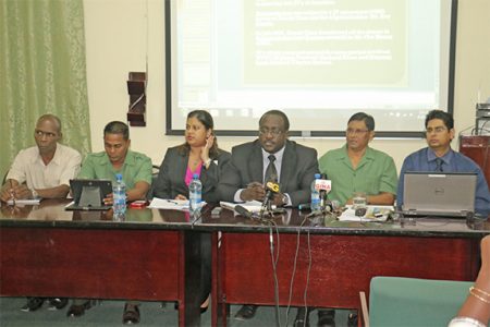 Guyana Forestry Commission (GFC) commissioner James Singh (second from right), GFC’s legal officer Jacy Archibald (third from right), GFC Head of Planning and Development Division, Pradeepa Bholanauth (third from left), Deputy Commissioner of Forests Tashreef Khan (second from left) and other GFC officials at the news conference yesterday.
