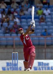 Kieron Pollard belts a biggie during the first One-day International against Bangladesh. (WICB photo/Randy Brooks of Brooks Latouche Photography) 