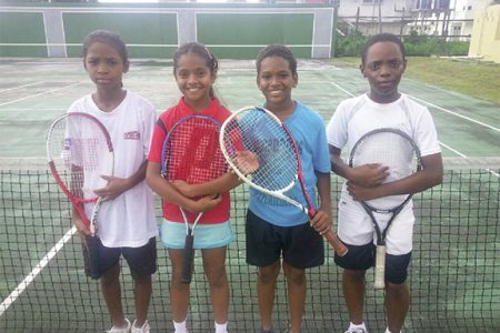 National U-12 lawn tennis team members (from left to right): Kalyca Fraser, Sarah Klautky, Vijay Sharma and Antoinne Andries
