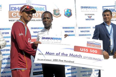 Sunil Narine receives the Man of the Match prize from Grenada PM Dr. Keith Mitchell during the 2nd Dhaka Bank ODI West Indies v Bangladesh at Grenada National Stadium, St. George’s, Grenada  yesterday. WICB Media Photo/Randy Brooks