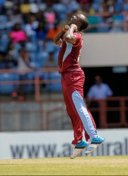 Kemar Roach celebrates Tamim Iqbal caught during the 2nd Dhaka Bank ODI West Indies v Bangladesh at Grenada National Stadium, St. George’s, Grenada yesterday. WICB Media Photo/Randy Brooks