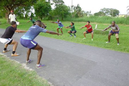 ON THE ROAD TO MEXICO! The national rugby sevens squad under the watchful eyes of Barrington Browne doing fitness drills at the National Park yesterday.
