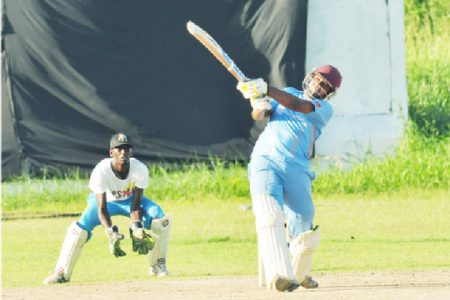 Jeetendra Sukhdeo smashes a huge six out of the ground during his top score of 45
