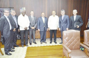 President Donald Ramotar (third from right) and Minister of Foreign Affairs (ag), Robeson Benn (third from left) with the Brazilian team headed by Governor of Roraima, Francisco Rodrigues(4th from right) (Ministry of Foreign Affairs photo)