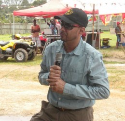 Natural Resources Minister Robert Persaud addressing the gathering in Port Kaituma (GINA photo)