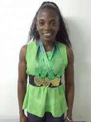  Alisha Fortune posing with her medals yesterday. 