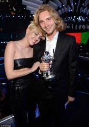Night to remember: Miley Cyrus and her homeless, wanted date Jesse attend the 2014 MTV Video Music Awards at The Forum August 24 in Inglewood, California 