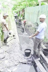 Workers desilting a community drain during the campaign (Government Information Agency photo) 