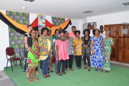 Staff of the Ministry of Housing displaying their emancipation day attire on Thursday. (GINA photo)