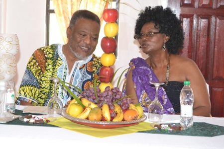 Prime Minister Samuel Hinds and Proprietress Janice Mc Almont, J&C Renaissance Banquet Hall, discoursing during the opening ceremony.(GINA photo)