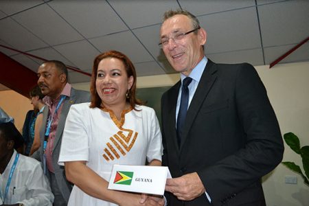 Guyana’s Foreign Minister Carolyn Rodrigues-Birkett (left) and European Commissioner for Development Andris Piebalgs after the signing of Guyana’s NIP. (EU photo)