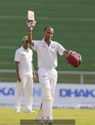  Kraigg Brathwaite celebrates his century during the first day  of the first Test between the West Indies and Bangladesh at Arnos Vale Sports Complex, St. Vincent yesterday. (Photo: WICB/BrooksLaTouche)