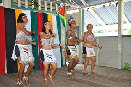 A group performing a traditional dance during the ceremony at the launching of the Santac Tours and Travel service. (GINA photo)