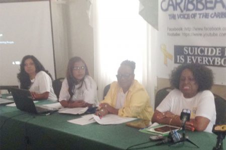(From left to right) Diane Madray of the Caribbean American Domestic Violence Awareness (CADVA), Bibi Ahmad, Vice President of Caribbean Voice Inc., Dawn Stewart, Washington-based social activist, and Faith Harding, local social activist, during yesterday’s observance of World Suicide Prevention Day