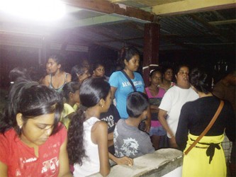 Residents gathered at Reena Singh’s home to offer their sympathy 