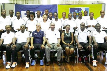 GFF President Christopher Matthias (centre sitting) and CONCACAF Head of Referees Peter Pendergast (third from left sitting) posing for a photo opportunity with participating referees following the conclusion of the FIFA Referees Assistance Program (RAP)
