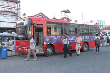 One of the 44-seat buses parked at the Stabroek Market Square on Monday.